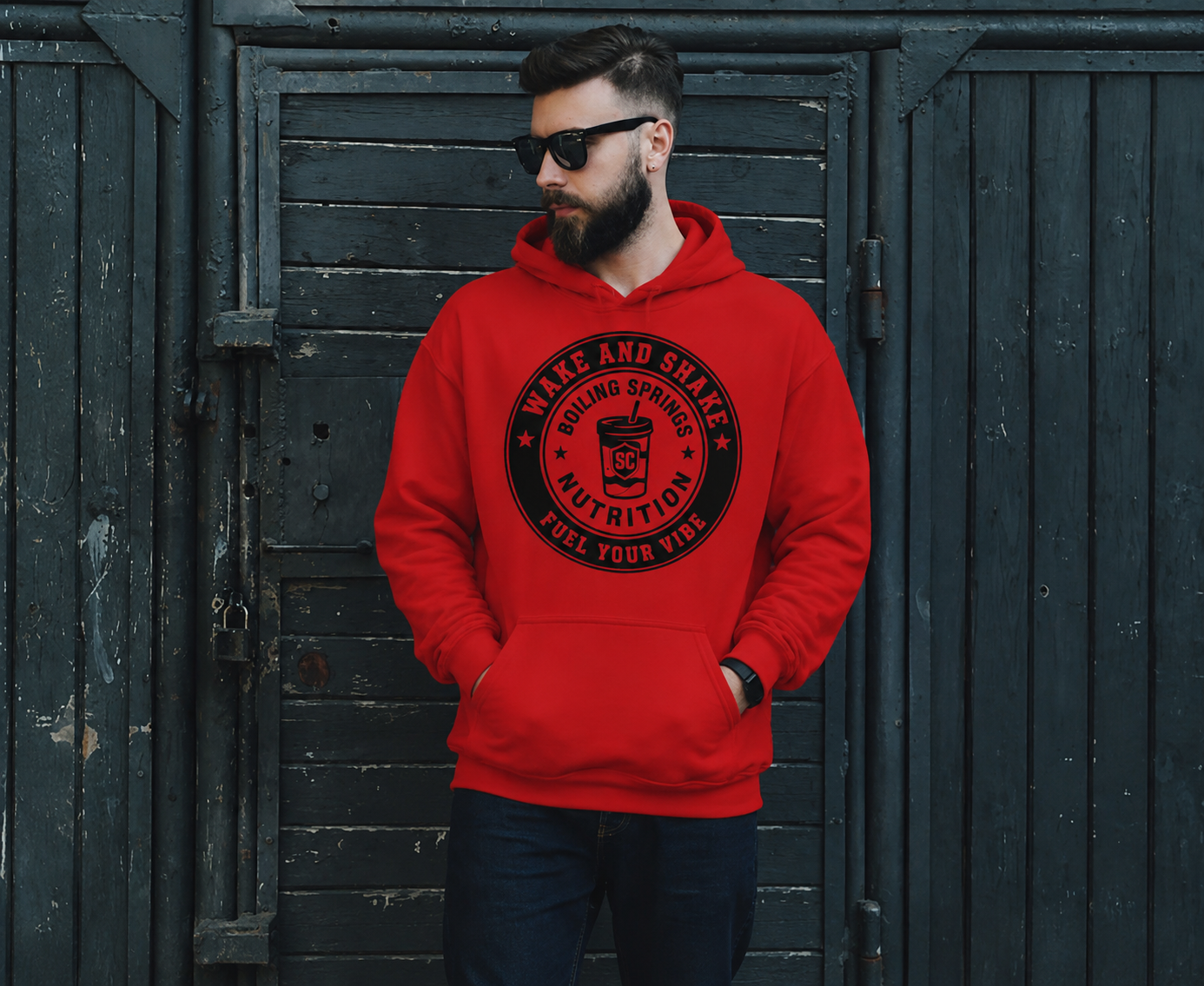 Man wearing a red Wake and Shake BSN hoodie